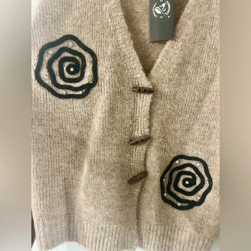 S. Christina Beige Cardigan with Black Spiral Accents